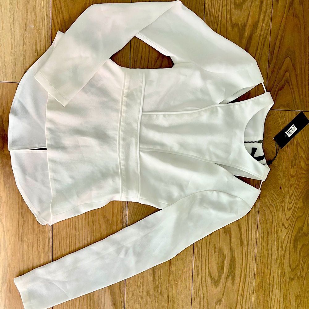 NWT BCBG long sleeve peplum top